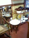 Round table with Italian marble (marked). Vintage Rocker. Mirror. Standing ashtray. Baker's Rack. Canister Sets.