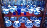 Set of Blue Willow marked Japan. Also, blue Colony by Whitehall tea glasses. Blue Hazel Atlas salt & pepper.