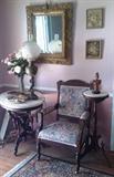 Antique marble top mahoganny table & plant stand. Eastlake arm chair. B&H banquet lamp. Antique mirror.