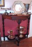 Silver plate on mahogany table