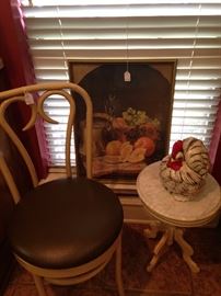 Bentwood chair; still-life art; smal table and hen