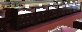 16 L.E.D. - lit solid wood jewelry cases(with door-locks) plus 3 additional matching cases, all with storage ---- Width: 53 ¾ inches----Depth: 23 ¾ inches ----Height: 41 ½ inches --------  Call  903-714-8140  for more details. (NOT at the sale site.) 