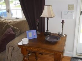 end table and decor. nickel candlesticks and snuffer, marble coasters.