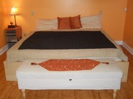 mattress. all organic. no toxic flame retardents. comes with frame (king size). less than one year old. pillows, sheets, pillowcases, headboard included (not pictured). Storage bench.