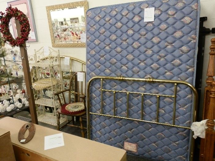 Solid brass! NOT plated! The mattress & box spring are in new condition! The other "brass headboard to the left of this photo is brass plated.