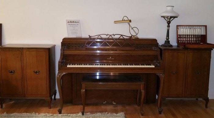 Steinway upright piano, matching music storage cabinets