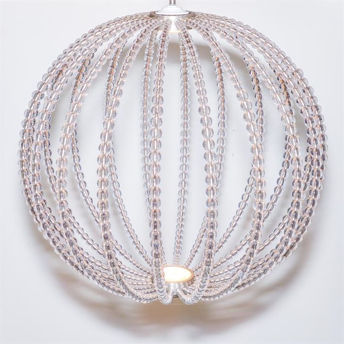 Modern LED Light Fixture: A modern LED light fixture. This light is composed of multiple strands of clear plastic bubble beads on metal strands. The LED light is in the center on the top and bottom.