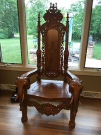 Heavily carved elephant chair
