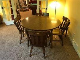 Round oak table with matching 4 chairs