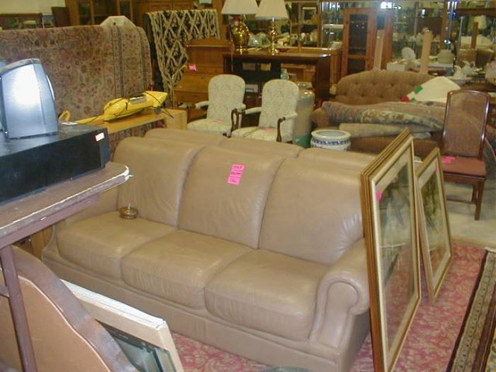 one left clean leather couch - $122.50 = 1/2 off on Tuesday