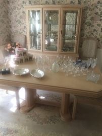 Blonde formal dining table with 8 chairs and one large leaf with matching china cabinet and server