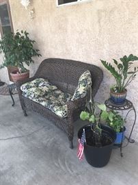 Wick patio furnisher, beautiful plants 