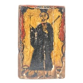 Antique Spanish Colonial Retablo of San Ignacio de Loyola: A late 18th to early 19th Century Spanish Colonial Retablo image on pine of San Ignacio de Loyola (Saint Ignatius of Loyola, 1491-1556). The image shows the saint in a black, wearing a biretta, holding a cross in his right hand and his mace in his left. He is standing against a light yellow background with red drapes on the borders The rustic painting is executed in black, red blue and yellow on a rough hewn board. 1938.0531