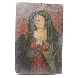 Antique Retablo of Nuestra Señora de los Dolores: An early 19th Century Spanish Colonial Retablo image on board, a fine depiction of Nuestra Señora de los Dolores (Our Lady of Sorrows). The image shows the Mary in a white dress and blue robe, a sword piercing her heart beneath clasped hands. The rustic painting is executed in black, red, blue and yellow on a rough hewn board. 1938.0549