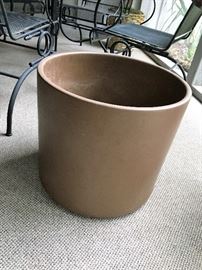 WE HAVE TWO LARGE FLOWER POTS