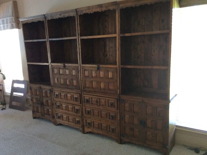 Spanish bookcases, two opens to desks, priced individually or as a group of 4