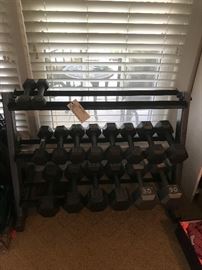 #24 Weight set w 16 weightes on stand $75 