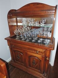 oak server with vintage glassware, has lined drawer for silver.