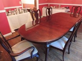 Queen Anne dining room set. Table has two leaves, four chairs and 2 arm chairs (one has damage), perfect opportunity to mix and match chairs or use wing back chairs in place of the arm chairs. Or fix the damaged one. Price will be adjusted to cover cost of repair!!