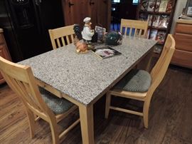 Granite top kitchen table with four chairs