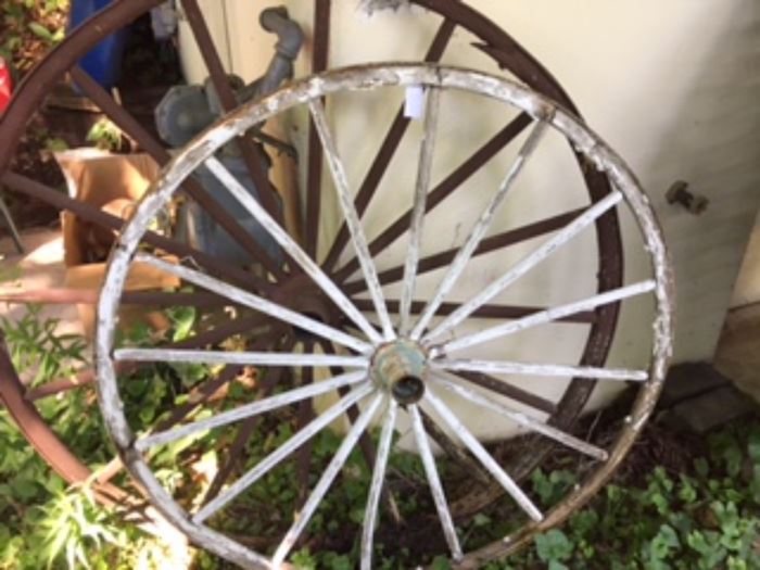 Two antique 16 spoke wagon wheels