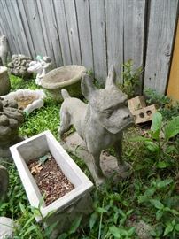 More concrete containers and statues