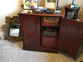 Vintage radio/record player in cabinet