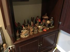 TV armoire filled with more Tom Clark gmomes