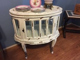White oval distressed tea table, opens on both sides with removeable tray! This is not half price it is owned by a friend $190 firm