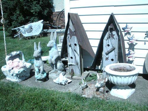 Just a small sampling of cement yard ornaments in need of a good new home/yard.