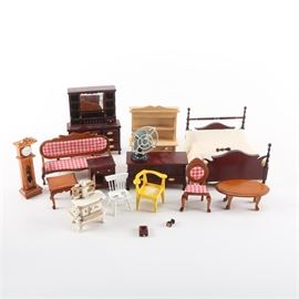 Doll House Furniture: A collection of doll house furniture. This group includes a settee, four poster bed, coffee table, end stand, parlor chair and more. Many of the pieces are made of wood the fan and stove are plastic. These pieces are unmarked.