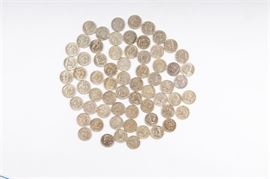 Grouping of Benjamin Franklin Silver Half Dollars: A grouping of approximately 66 Benjamin Franklin silver half dollars ranging from 1949 to 1960. Designer: John R. Sinnock. Metal Content: 90% silver, 10% copper. Diameter: 30 mm. Weight: 12.5 grams (each). Circulated. Conditions vary.
