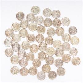 Grouping of 1964 Kennedy Silver Half Dollars: A grouping of approximately fifty-two 1964 Kennedy silver half dollars. Designer: Gilroy Roberts. Metal Content: 90% silver, 10% copper. Diameter: 30 mm. Weight: 12.5 grams (each). See also 17CIN316-070.