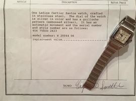 Cartier ladies Santos watch with stainless steel band.