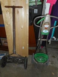 vintage lawn mower and scotts spreader
