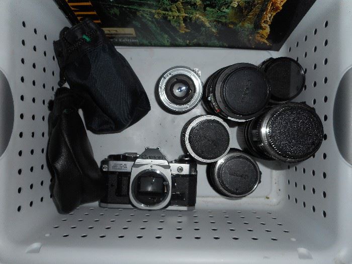 Canon 35 mm  AE-1 camera with six lenses