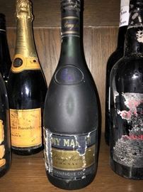 many bottles of unopened vintage liquor