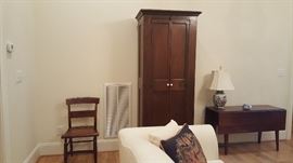 19th Century side chair-Birdseye Maple, Cane bottom . Tall cupboard-mixed wood, age unknown, American. 19th Century drop leaf table-walnut Hepplewhite leg.