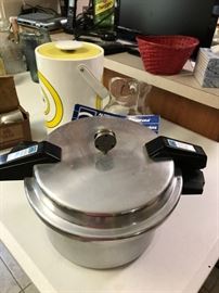 Nearly new pressure cooker with manual and all parts.