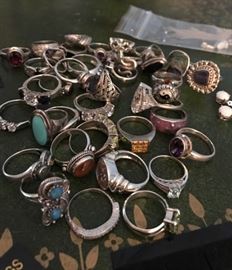 A bunch of sterling silver rings.