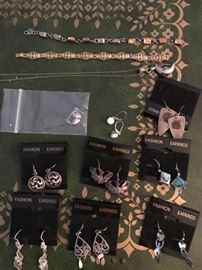 Sterling earrings, bracelets and necklaces.