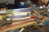 4 crosscut saws - inlc 3 bucks with single handles
Fireman's axes
stacks of files of every size