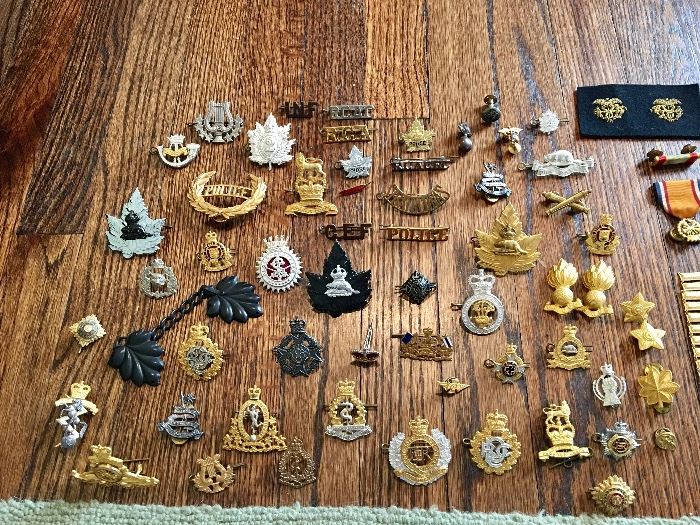 Many WWII Canadian military badges and insignias