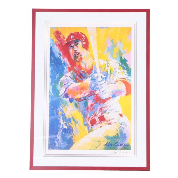 LeRoy Neiman Offset Lithograph of Mark McGwire: An offset lithograph of former St. Louis Cardinals Major League Baseball player Mark McGwire by listed artist LeRoy Neiman (1921 – 2012). The work depicts McGwire holding a bat, looking upward in vibrant primary colors. The work is signed in plate and in ink to the lower right by the artist. It is presented in a white mat and a red frame under glass. The piece is wired on the verso for hanging.