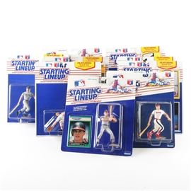 MLB Starting Lineup Sports Super Star Collectible Action Figures: A collection of MLB Starting Lineup Sports Super Star action figures. This assortment includes nine figures. It features two Wally Joyner, Wade Boggs, Nolan Ryan, Kevin Mitchell, Jerome Walton, Don Mattingly, and two Roger Clemens. Each figure comes with a collectible trading card. Each comes n their original, unopened packaging.