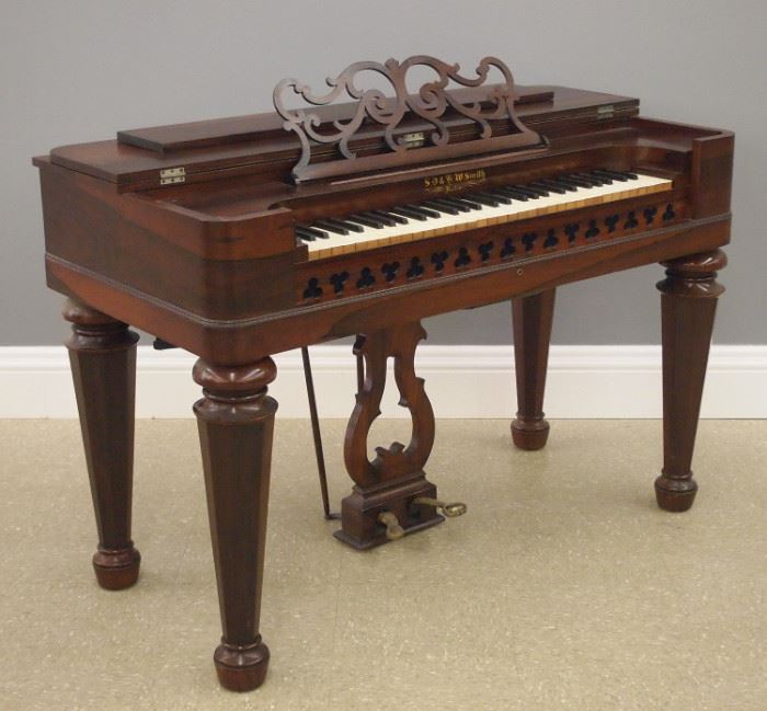 American Empire Transitional Period rosewood melodeon by S. D. & H. W. Smith of Boston, Mass., 19th century.