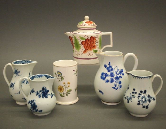 English porcelain collector's group of jugs and a spill vase, including Wedgwood, late 18th-mid 19th century.