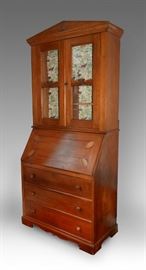 An unusual 19th C. Primitive Style Bierdermeier secretary bookcase with glazed upper doors, cubbyholes, and drawers in the base. A very nice hand made piece with lovely oak leaf carving, size 84" H x 39" W. x 20 D.
Condition
Very good
Starting Bid
$650.00
Buyer's Premium

    22%