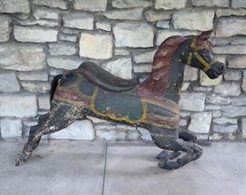 19th Century hand carved portable Carousel Horse possibly attributed to Charles Dare, circa 1870 - 1880 with original paint, 48" L x 36 1/2" H.
Condition
fair to good: splits to wood especially at joints and much wear to the paint, reinforced with metal plate at knee
Starting Bid
$400.00
Buyer's Premium

    22%