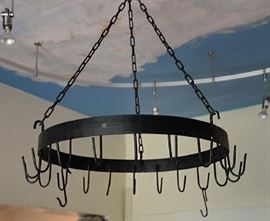 Handmade iron pot rack with removable hooks, hanging from chain, in round shape, 23" Diameter.
Condition
good: wear and rust consistent with age and use
Starting Bid
$40.00
